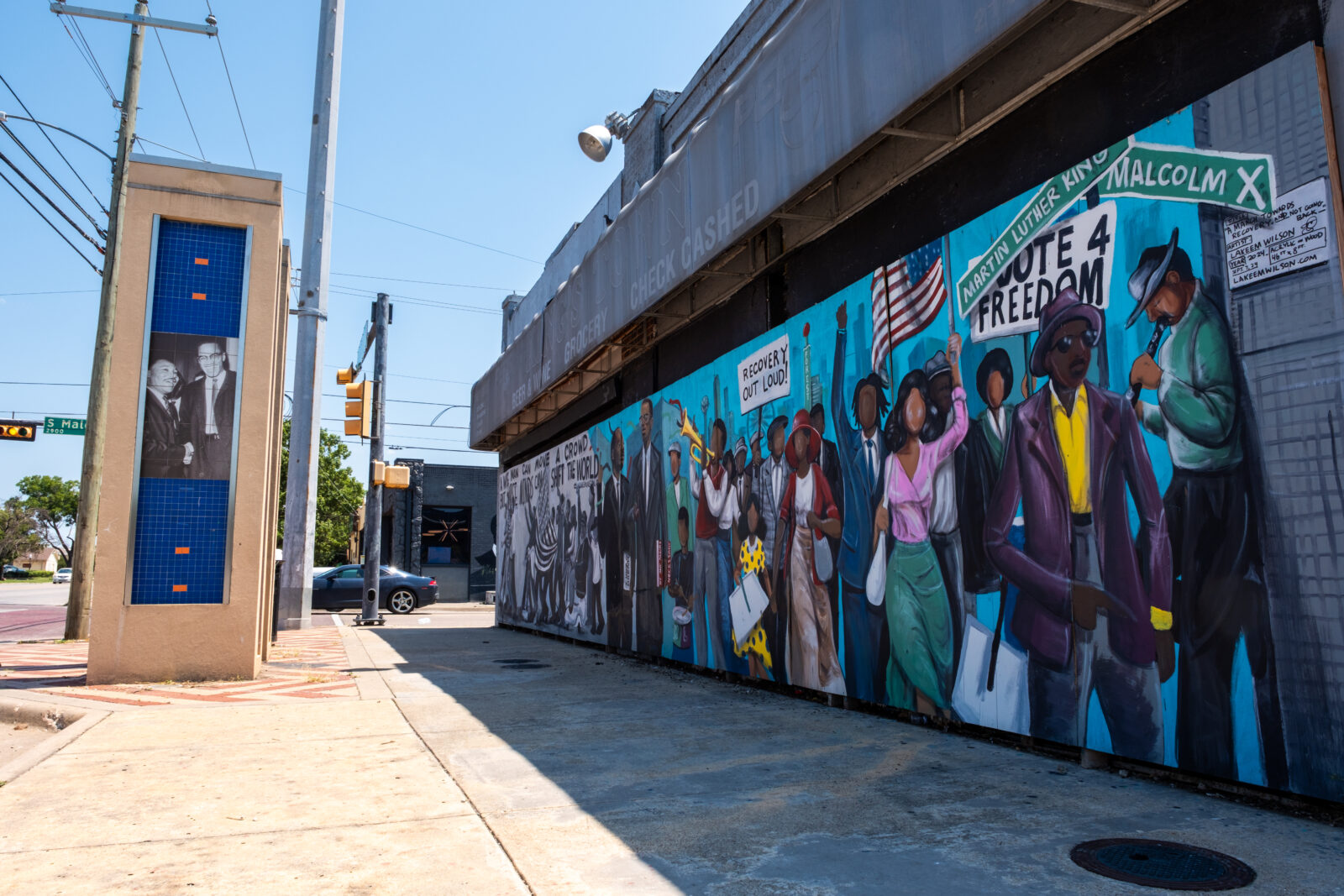 Historic South Dallas mural featuring Martin Luther King Jr., Malcolm X, and civil rights activism